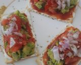 A picture of step 4 of #GA4 WEEK10 Sky flake cracker topped with cream cheese & avocado.