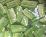A picture of step 2 of Aloo-Sem/potato-butter bean Pickle.