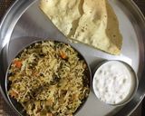 A picture of step 14 of Veg Hyderabadi Biryani with Boondi raita.