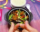 A picture of step 5 of Singapore Frog Porridge.