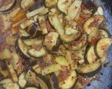 A picture of step 7 of Achari Aloo Baingan.