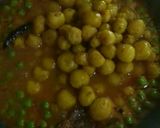 A picture of step 12 of Baby Potato Curry with Green Peas.