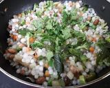 A picture of step 7 of Sabudana Vegetable Khichdi With Cucumber Pomegranate Raita.