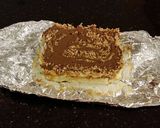A picture of step 18 of Caramel Coconut Cheesecake Bars.