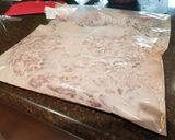 A picture of step 1 of Hearb roasted leg of lamb roll with potatoes and carrots.