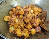 A picture of step 10 of ALOO DO PYAZA..