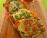A picture of step 7 of Cheesy masala pav toasty Open pav sandwich.