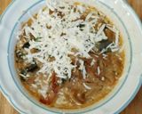 A picture of step 5 of Spicy, cheesy Tomato, mushroom noodle soup.