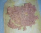 A picture of step 3 of Egg wrapped in sausage and puff.
