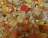 A picture of step 3 of Saucy chana salad.