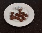 A picture of step 6 of Coconut Macaroon s with a Chocolate Center.