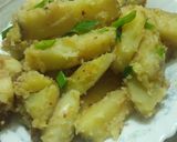 A picture of step 7 of Garlic buttery potato wedges.