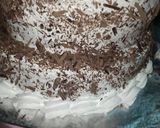 A picture of step 17 of Two tier vanilla and chocolate cake 🎂.