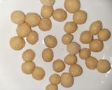 A picture of step 3 of Italian honey balls.