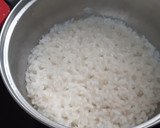 Foto del paso 3 de la receta: Conejo encebollado con arroz blanco al ajillo