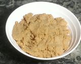 A picture of step 1 of Mawa apple stuff with dryfruits (sweet dish).