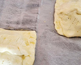 Foto del paso 11 de la receta: Hojaldres de champiñones, atún huevo queso aceitunas