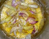 A picture of step 9 of Dambu shinkafa with veg.sauce.