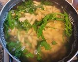 A picture of step 5 of Cavatelli with tomato and rocket.