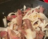 A picture of step 10 of Stir-Fried Beef with Ginger and Green Onion.