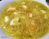 A picture of step 6 of Vegetable and Turmeric Soup with Noodles and Poached Egg.