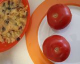 A picture of step 1 of Baked Stuffed Tomato in Creamy Spinach.