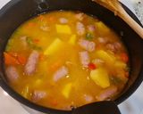 Foto del paso 5 de la receta Salchichas guisadas con patatas y zanahorias