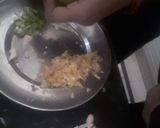 A picture of step 4 of Masala Ghobi with Roti.