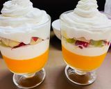 A picture of step 7 of Orange jelly with creamy fruit delight.