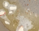 A picture of step 3 of Leftover roti Churma lodoo.