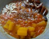 A picture of step 5 of Tomato chutney with dates and mango pulp candy.