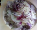 A picture of step 1 of Chicken mtr pulao.