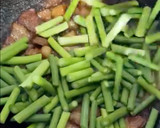 A picture of step 4 of Stir-Fried Garlic Scapes with Pork Belly.