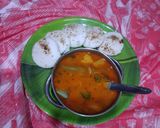A picture of step 8 of Sambhar with idli.