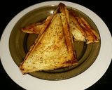 A picture of step 8 of Tex's Chicken, Cheese, and Red Onion Toastie, Jaffle, Sanga.
