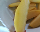Foto del paso 3 de la receta: Patatas condimentadas al horno