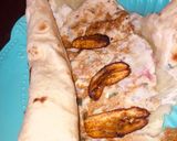A picture of step 3 of Fried egg and plantain wraped in pita bread.