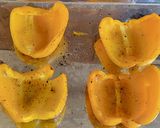 A picture of step 6 of Curried potato filled peppers with cheese.
