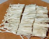 A picture of step 2 of Stir-Fried Spinach and Enoki Mushrooms with Shacha Sauce.
