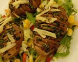 A picture of step 3 of Hasselback Potatoes Served with garden fresh salad.