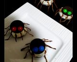 A picture of step 16 of "Spooky Halloween Spider Cupcakes"🧁🕷️.