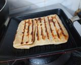 A picture of step 4 of Grill cauliflower pocket.