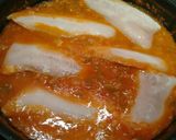Foto del paso 3 de la receta Merluza en salsa de tomate y pimiento verde