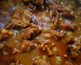 A picture of step 8 of Ragi mudda with mutton curry.