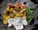 A picture of step 5 of Chicken curry with winter veggies.