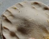 A picture of step 6 of Gobhi paratha with mitha Dahi.