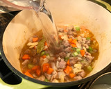 A picture of step 4 of Simple Cabbage & Bean Soup with Pork.