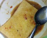 A picture of step 2 of Fried Bread with Egg.