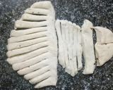 A picture of step 10 of Garlic Bread Santa.