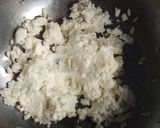 A picture of step 2 of Dahi ke sholey fried hung curd roll.